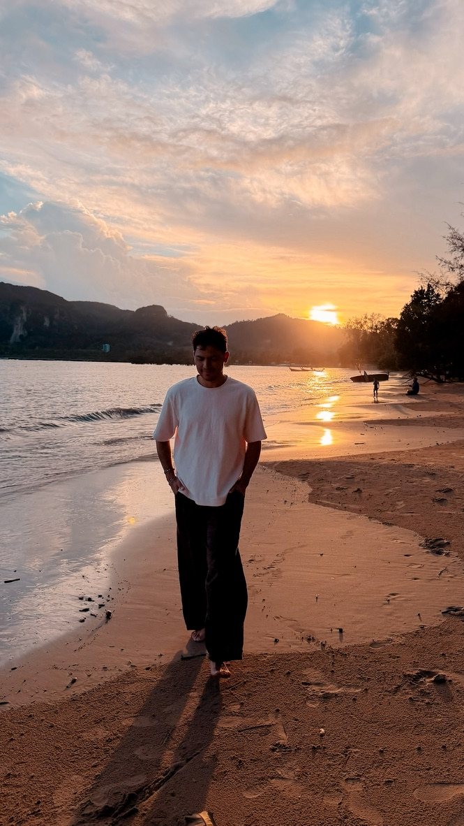 Walking on the beach at sunset