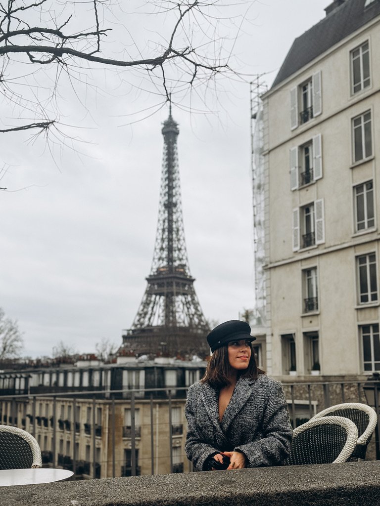 Katerina in Paris with the Eiffel Tower in the background